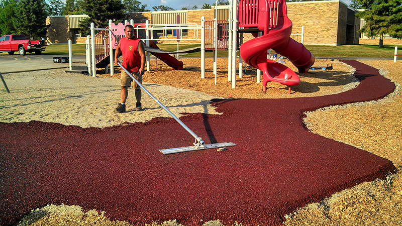 applying porous pave to a playground area